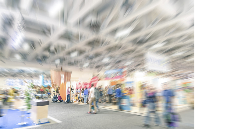 Generic trade show stand with blurred zoom defocusing - Concept of business social gathering for international meeting exchange